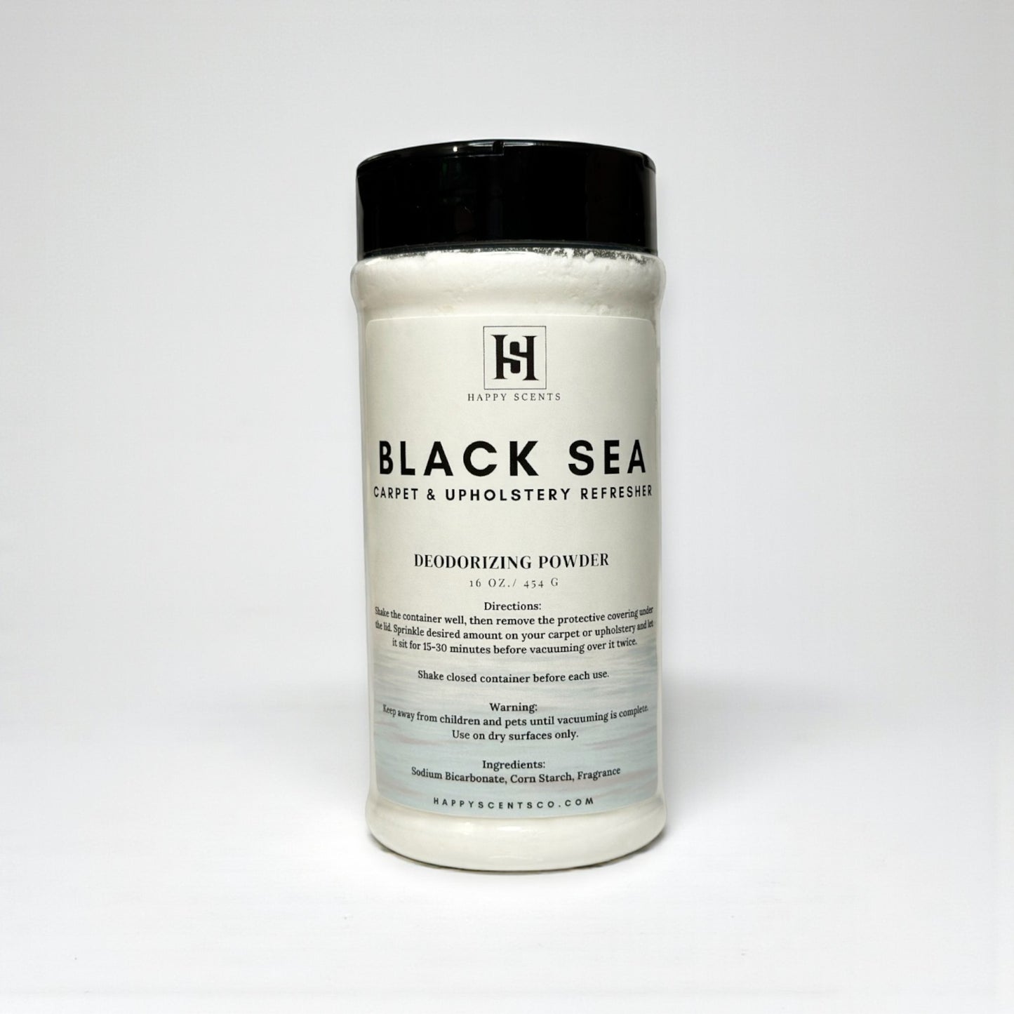 Container of 'Black Sea' deodorizing powder on a white background