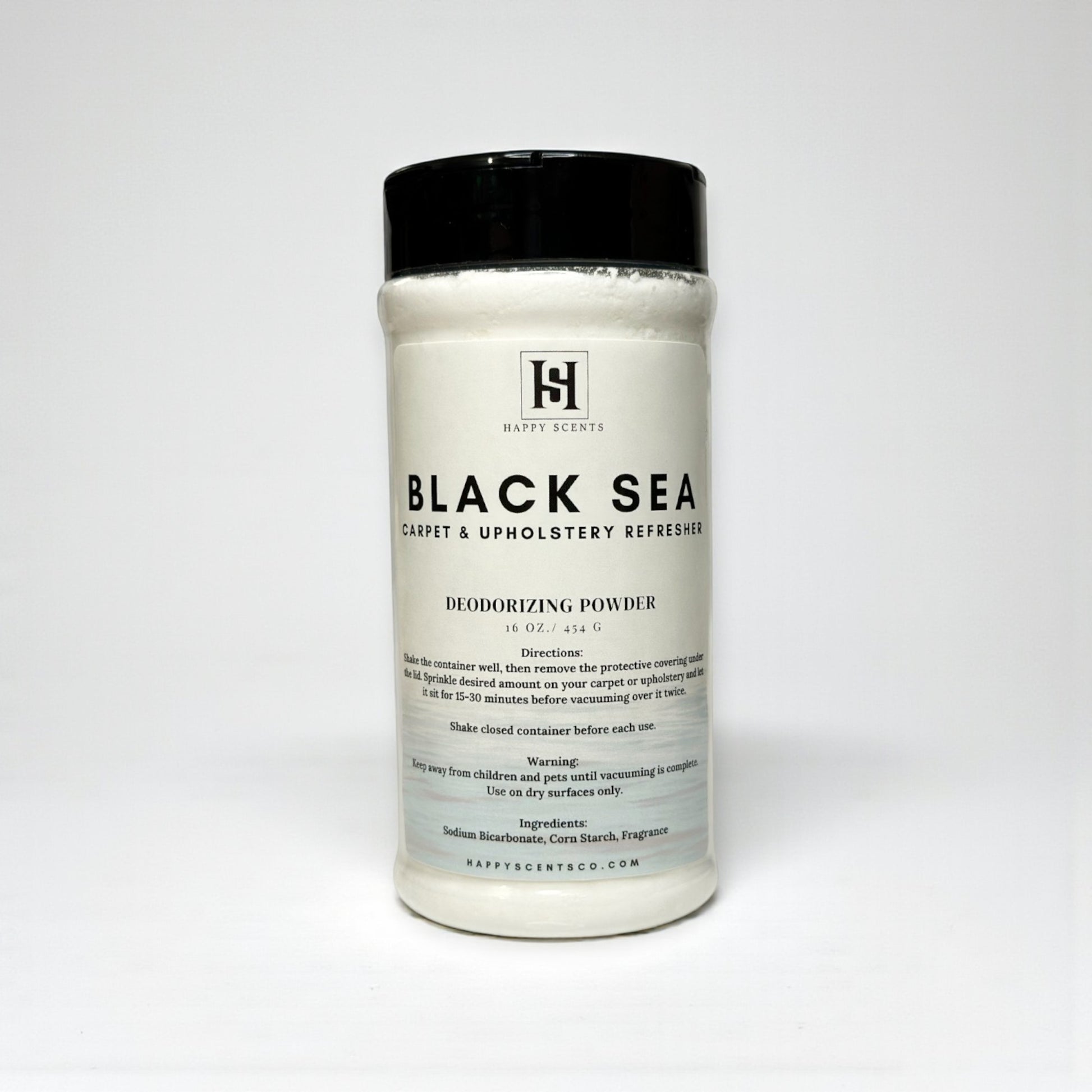 Container of 'Black Sea' deodorizing powder on a white background