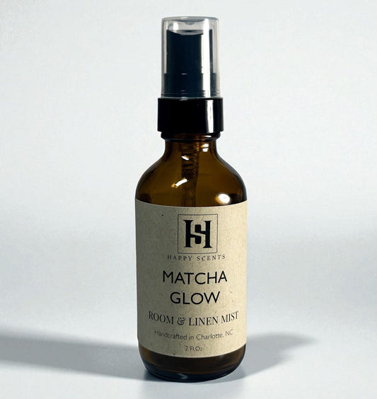 Bottle of Matcha Glow Room & Linen Mist by Happy Scents on a white background