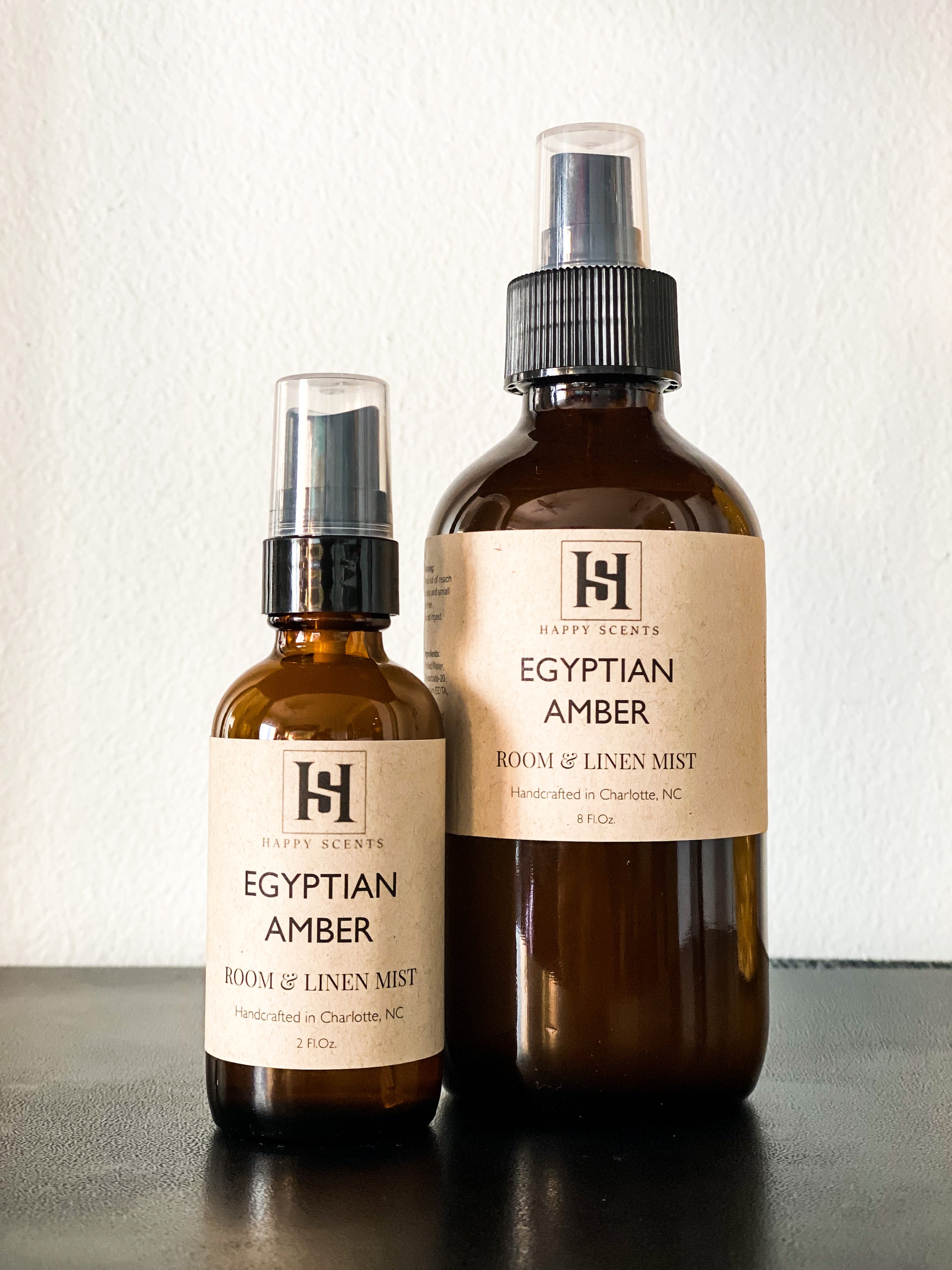 Egyptian Amber Room and linen mist in 2oz and 8 oz amber spray bottles. 