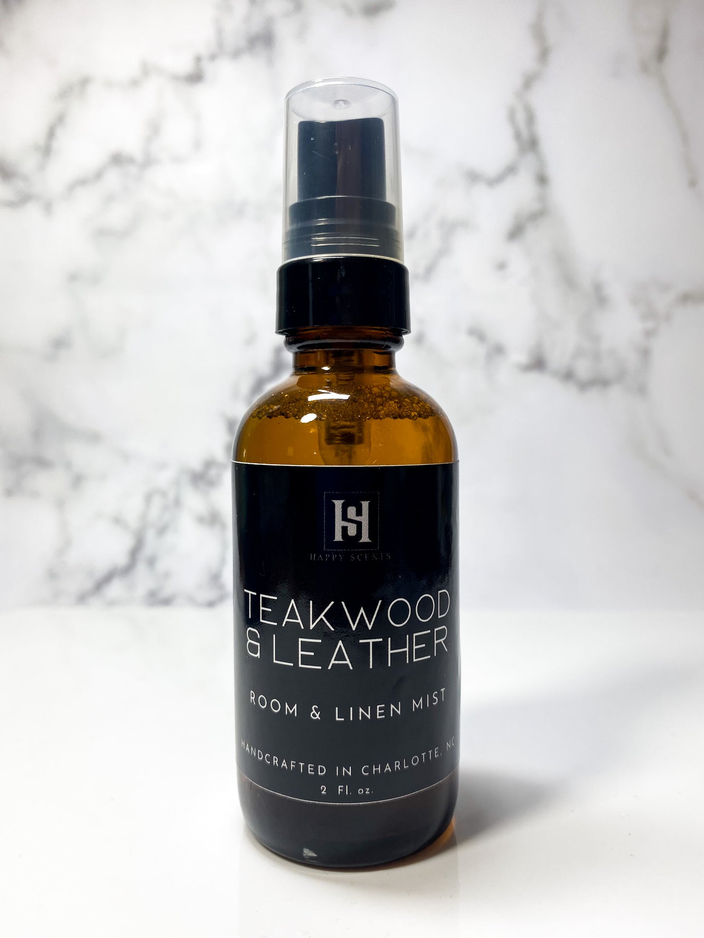 teakwood & leather room and linen mist by Happy Scents